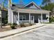 Well maintained community clubhouse with a covered porch, landscaping, and parking at 533 Mount Gerizim Se Rd, Mableton, GA 30126