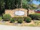 Stone community entrance sign surrounded by manicured landscaping at 533 Mount Gerizim Se Rd, Mableton, GA 30126