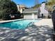 Community pool with refreshing water, surrounded by a fence and concrete deck at 533 Mount Gerizim Se Rd, Mableton, GA 30126