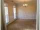 Formal dining room includes chair rail, chandelier and multiple windows for great light at 533 Mount Gerizim Se Rd, Mableton, GA 30126