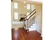 Bright entryway boasts hardwood floors and staircase leading to the upper level at 533 Mount Gerizim Se Rd, Mableton, GA 30126