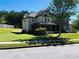 Well-maintained home with a large lawn, inviting covered porch, and mature trees at 533 Mount Gerizim Se Rd, Mableton, GA 30126