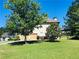 Home featuring a large lawn and a convenient two-car garage at 533 Mount Gerizim Se Rd, Mableton, GA 30126