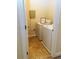 A convenient laundry room equipped with a washer and a dryer at 533 Mount Gerizim Se Rd, Mableton, GA 30126