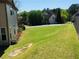 Side yard with lawn and view of neighborhood street at 533 Mount Gerizim Se Rd, Mableton, GA 30126