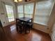 Bright dining area with hardwood floors and natural light at 5578 Swanson Rd, Ellenwood, GA 30294