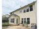 Back exterior of home featuring a mix of windows and doors at 5578 Swanson Rd, Ellenwood, GA 30294
