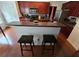 Kitchen with stainless steel appliances, granite countertops and dark wood cabinets at 5578 Swanson Rd, Ellenwood, GA 30294