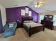 Serene main bedroom with vaulted ceiling, comfortable bed, and lots of natural light at 5578 Swanson Rd, Ellenwood, GA 30294