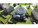 Aerial view of house with screened in porch, deck, and fenced yard at 6310 Stillwood Ln, Cumming, GA 30041
