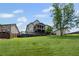Level backyard provides ample space to play and entertain and boasts a screened porch at 6310 Stillwood Ln, Cumming, GA 30041
