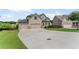 Charming home with a three-car garage, mature landscaping, and inviting curb appeal in a desirable neighborhood at 6310 Stillwood Ln, Cumming, GA 30041