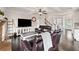 Cozy living room features hardwood floors, coffered ceilings, and decorative furnishings at 6310 Stillwood Ln, Cumming, GA 30041