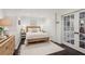 This bedroom features a comfortable bed, nice furnishings and lots of light at 750 Highview Ct, Woodstock, GA 30189