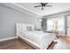 Cozy bedroom featuring hardwood floors, recessed lights, ceiling fan, and a window for natural light at 1496 Shadowrock Dr, Marietta, GA 30062
