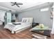 This bedroom features a kitchenette, unique coffee table and industrial style refrigerator at 1496 Shadowrock Dr, Marietta, GA 30062