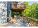 Deck area with an adjacent hot tub and an entrance gate for easy access at 1496 Shadowrock Dr, Marietta, GA 30062