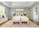 Inviting main bedroom features natural light, hardwood floors, and a decorative rug at 1496 Shadowrock Dr, Marietta, GA 30062