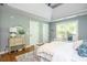 Bright main bedroom with hardwood floors, natural light, and a comfortable seating area at 1496 Shadowrock Dr, Marietta, GA 30062