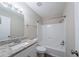 Bathroom features a single sink vanity and a shower/tub combo at 2091 Moon Drive Sw, Conyers, GA 30094