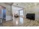 Dining room with decorative string lights, chandelier, wainscoting and wood floors at 2908 Cottesford Se Way, Smyrna, GA 30080