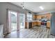 A kitchen with stainless steel appliances, wood cabinets and access to the backyard at 2908 Cottesford Se Way, Smyrna, GA 30080