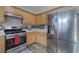 Kitchen features stainless steel appliances, light countertops, and plenty of storage space at 2908 Cottesford Se Way, Smyrna, GA 30080