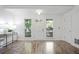 Bright entryway featuring hardwood floors and neutral paint at 402 Roswell Green Ln, Roswell, GA 30075