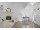 Bright living room with a painted brick fireplace at 402 Roswell Green Ln, Roswell, GA 30075