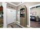 Open foyer with a view of the living area and beautiful tile flooring at 530 Mount Park Dr, Powder Springs, GA 30127