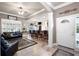 Spacious living room with bar seating, natural light, and an open floor plan at 530 Mount Park Dr, Powder Springs, GA 30127