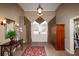 Elegant lobby with high ceilings, decorative lighting, and stylish furniture at 530 Mount Park Dr, Powder Springs, GA 30127