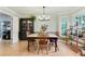 Inviting dining room with hardwood floors, natural light, and elegant decor at 1412 Oakridge Cir, Decatur, GA 30033