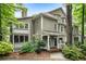 Charming two-story home with a welcoming front porch, lush landscaping, and a well-maintained exterior at 1412 Oakridge Cir, Decatur, GA 30033