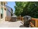 Wooden deck with covered grills, offering a space for outdoor cooking and entertaining at 6418 Crown Forest Ct, Mableton, GA 30126