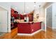 Kitchen view highlighting the breakfast bar and hardwood floors at 6418 Crown Forest Ct, Mableton, GA 30126