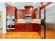 Gourmet kitchen features stainless steel appliances, ample cabinets, and granite countertops at 6418 Crown Forest Ct, Mableton, GA 30126
