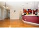 Kitchen view featuring a breakfast bar and hardwood floors at 6418 Crown Forest Ct, Mableton, GA 30126