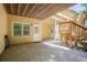 Back patio with brick pavers, offering space for entertaining, as well as stairs to upper deck at 6418 Crown Forest Ct, Mableton, GA 30126