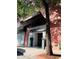 Kessler City Lofts entrance featuring a modern awning, planters, and brick facade at 87 Peachtree Sw St # 209, Atlanta, GA 30303