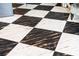 Stunning checkerboard pattern of black and white tiles creates a bold statement in this room at 87 Peachtree Sw St # 209, Atlanta, GA 30303