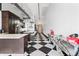 Expansive kitchen with checkerboard flooring, stainless steel appliances, and bright, open layout at 87 Peachtree Sw St # 209, Atlanta, GA 30303