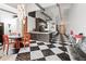 Stylish living space with adjacent dining and kitchen areas, featuring an open floor plan and unique decor at 87 Peachtree Sw St # 209, Atlanta, GA 30303