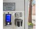 Modern security system with a welcome screen and call box for guests at Kessler CityLofts at 87 Peachtree Sw St # 209, Atlanta, GA 30303
