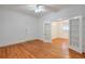 Bedroom featuring hardwood floors, white walls, and French doors leading to another room at , Atlanta, GA 30306