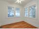 Bright room with hardwood floors, multiple windows and white trim at , Atlanta, GA 30306