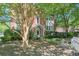 Charming brick apartment building with a well-manicured lawn and mature trees at , Atlanta, GA 30306