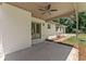 View of the covered patio with doors leading to home and the yard at 145 Devilla Trce, Fayetteville, GA 30214