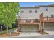 Multi-level home featuring attached garages and private decks, offering comfortable outdoor living spaces at 2300 Whiteoak Drive Southeast Se Dr, Smyrna, GA 30080