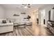 Spacious living room with hardwood floors, modern decor, and a comfortable sectional sofa at 2300 Whiteoak Drive Southeast Se Dr, Smyrna, GA 30080